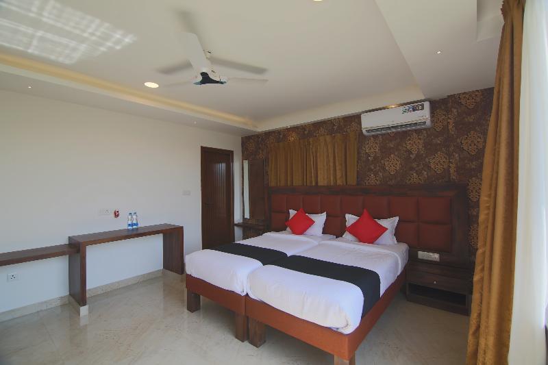 Hotel Capital O 36063 Ample Trees Bangalore