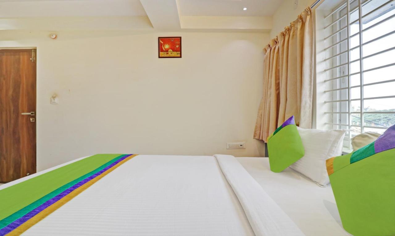 Treebo Trend Rotano Suites Padukone Dravid Centre Bangalore