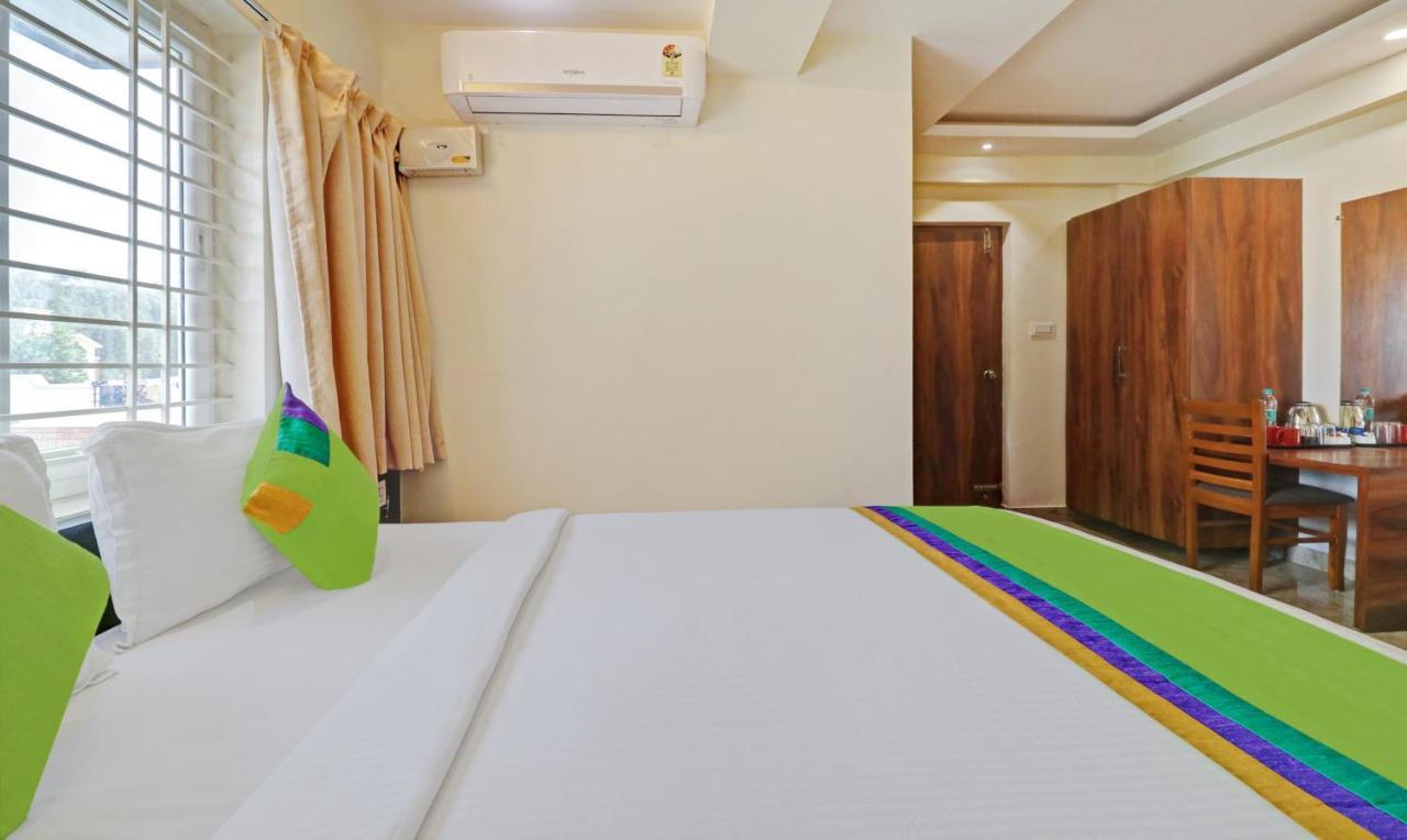 Treebo Trend Rotano Suites Padukone Dravid Centre Hotel