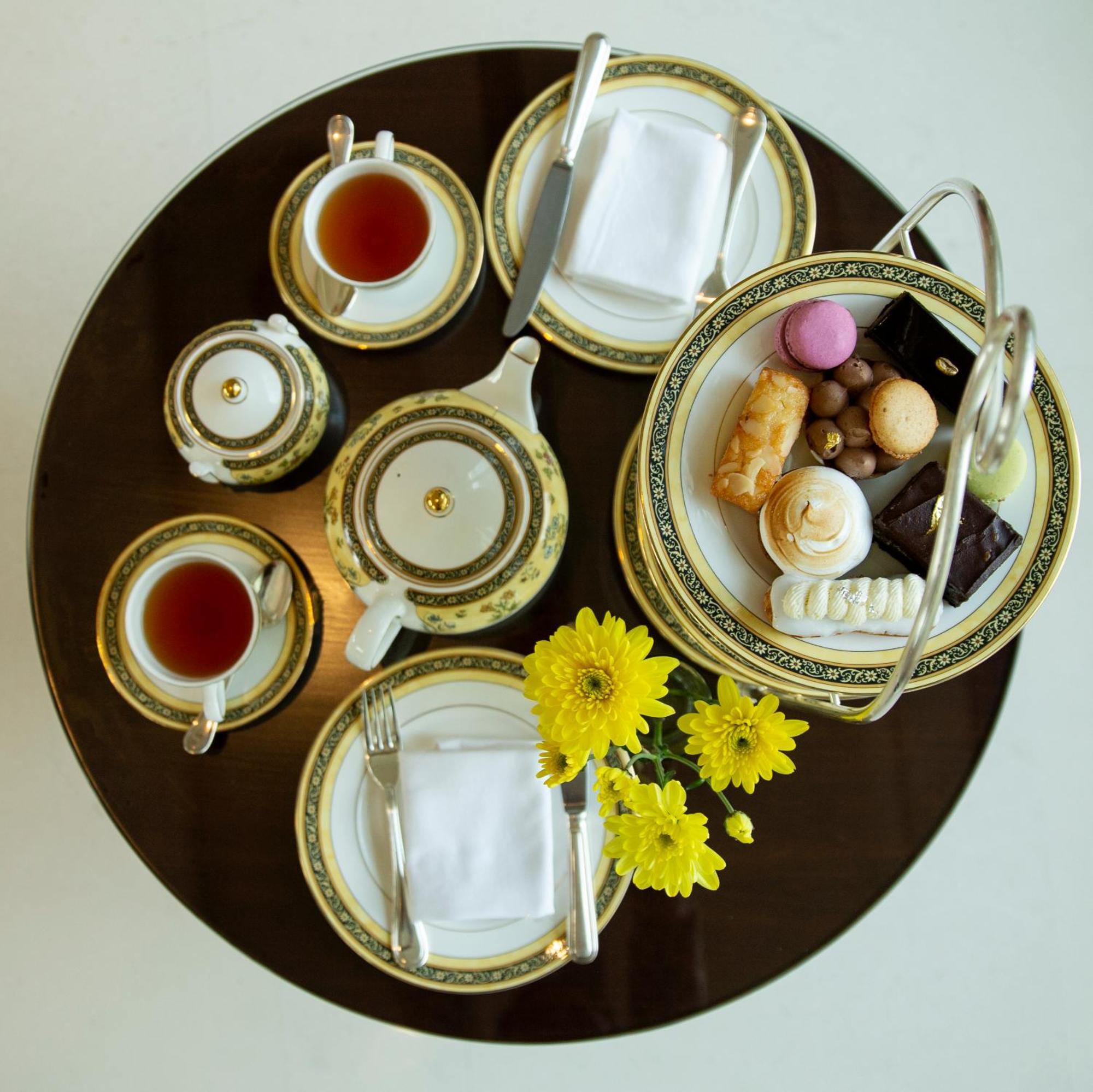The Ritz - Carlton,
