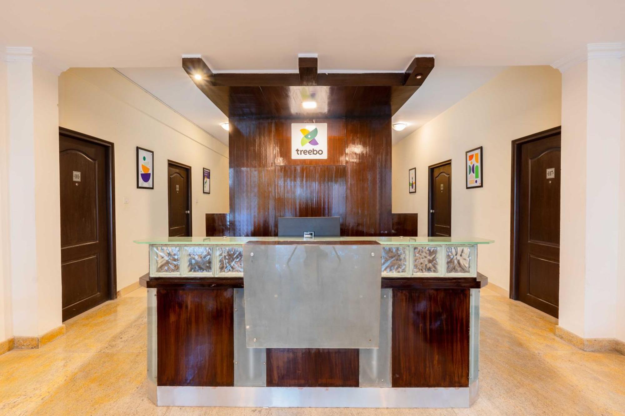 Treebo Ivory White Hotel