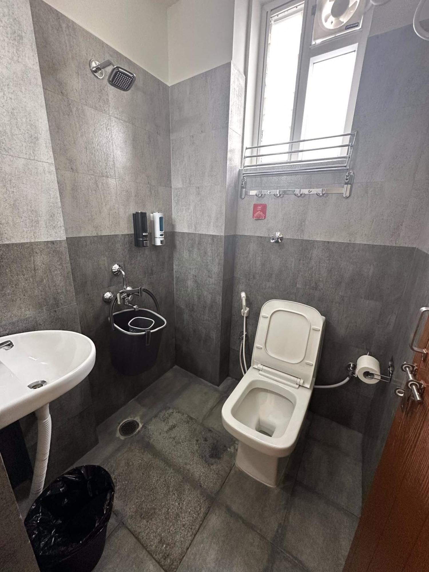 Trinetra Homes 102 Hotel Bangalore