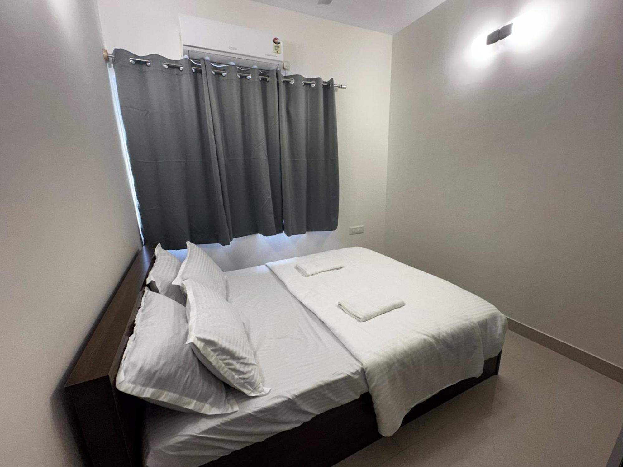 Trinetra Homes 102 Hotel Bangalore