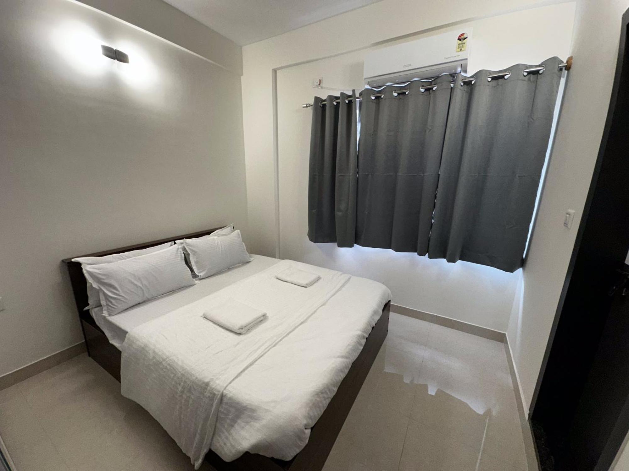 Trinetra Homes 102 Hotel
