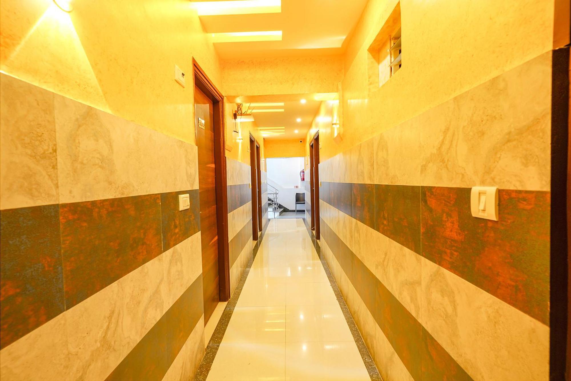 Fabexpress Royal N Comforts - Nr Shivoham Shiva Temple Hotel