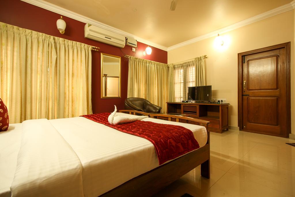 Oyo 24573 Eyrie Comforts Hotel Bangalore