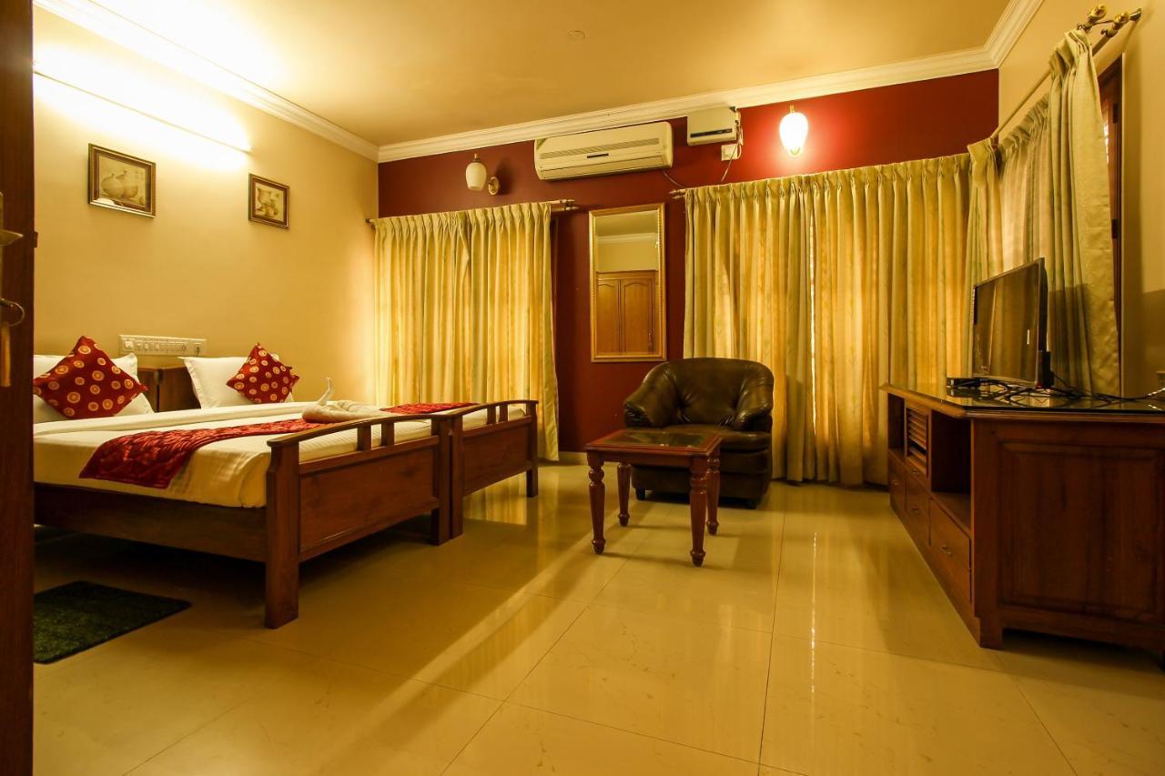 Oyo 24573 Eyrie Comforts Hotel Bangalore