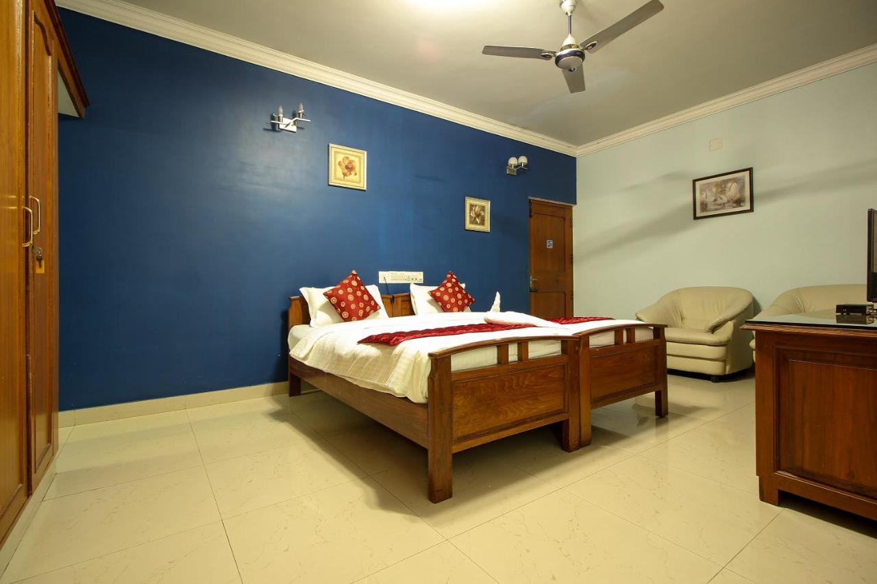 Oyo 24573 Eyrie Comforts Hotel Bangalore
