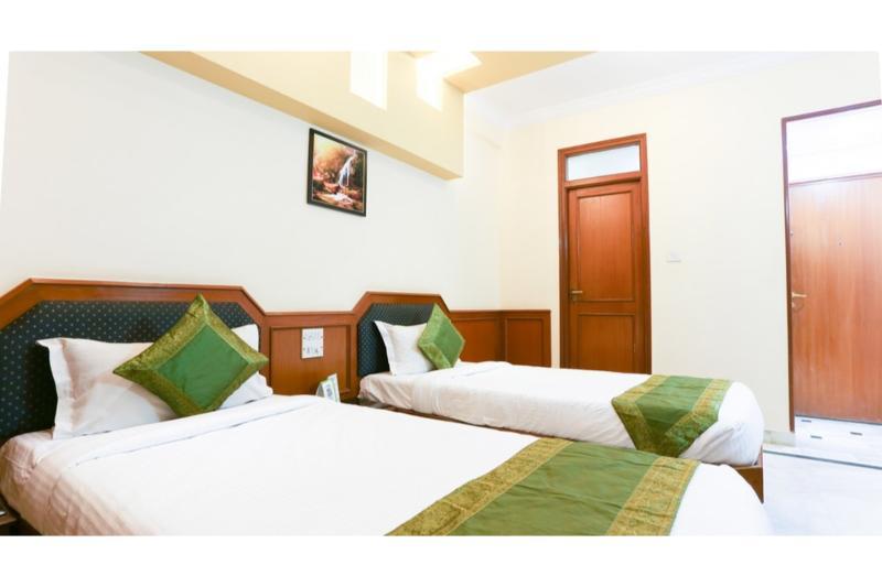 Treebo Adarsh Hotel Bangalore