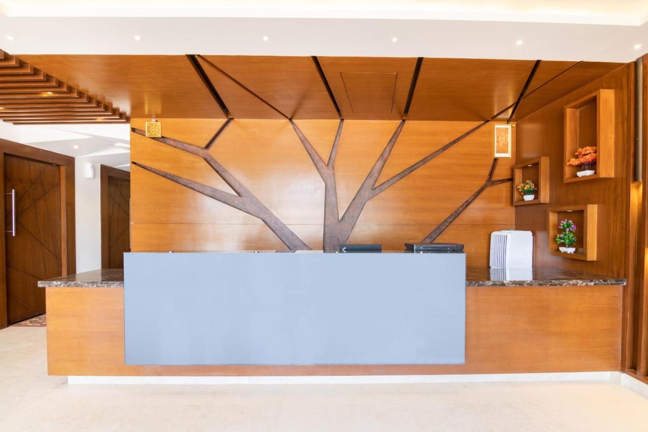 Capital O 36063 Ample Trees Hotel Bangalore