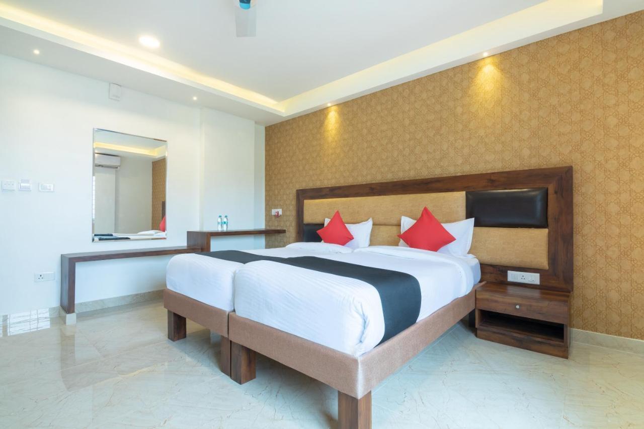 Capital O 36063 Ample Trees Hotel Bangalore