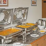 Treebo Sahara Suites 750 M From St Johns Medical College And Hospital