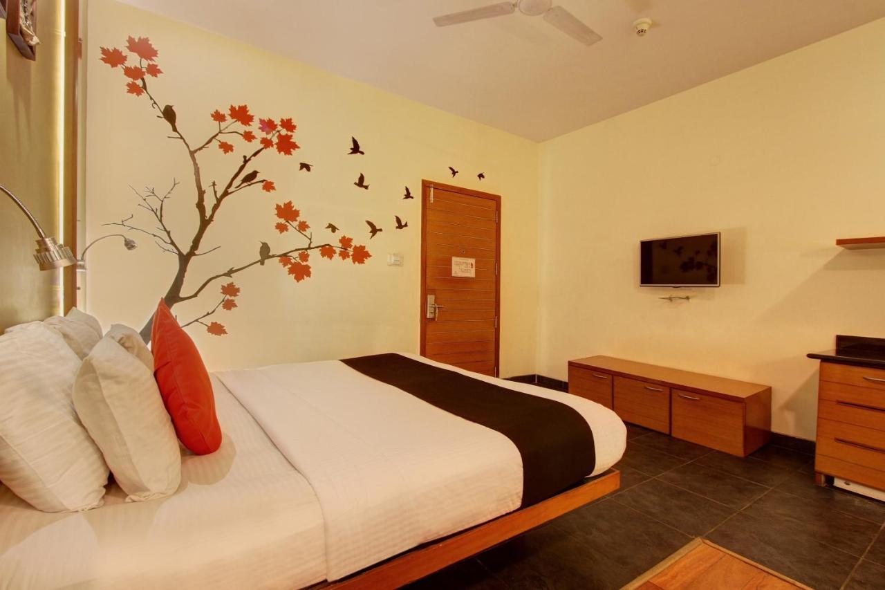 Capital O 16165 Cartier Hotel Bangalore