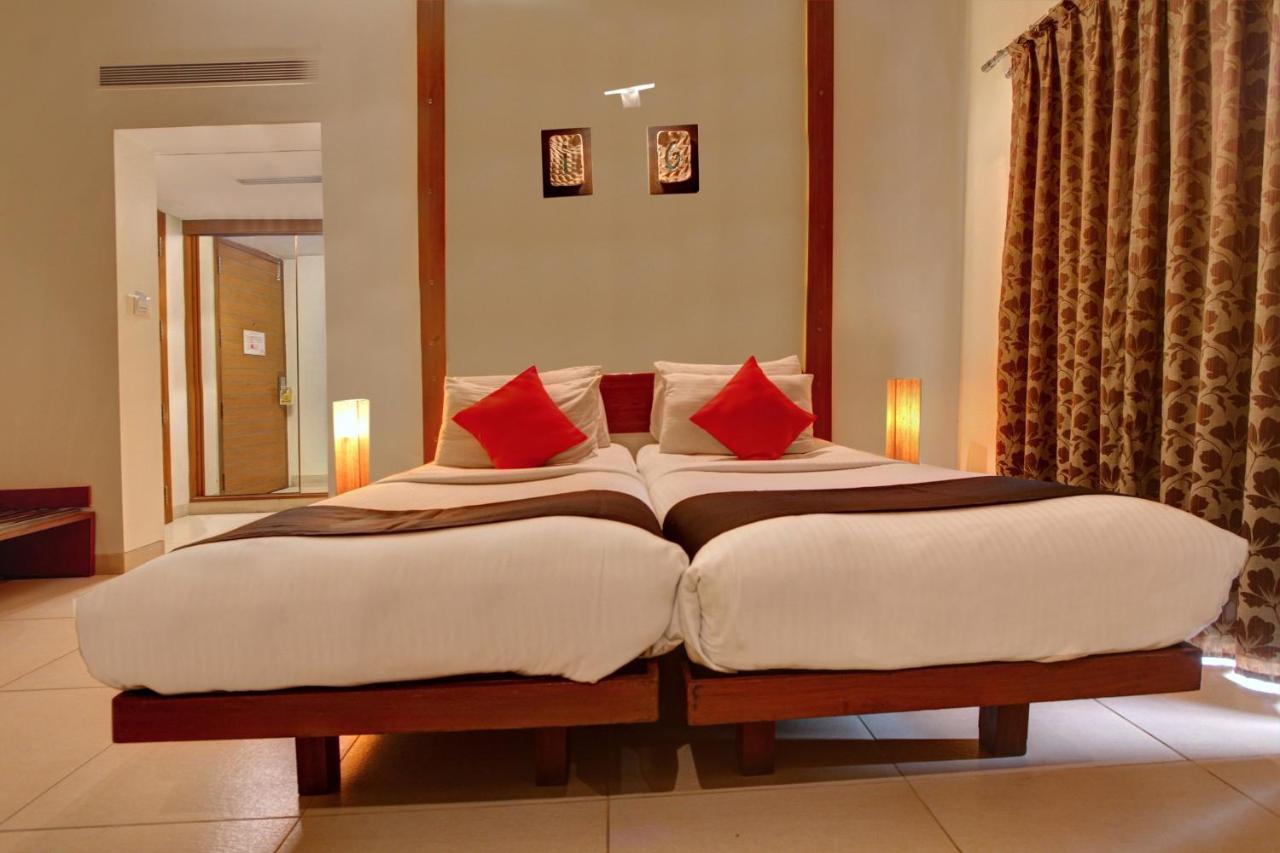 Capital O 16165 Cartier Hotel Bangalore