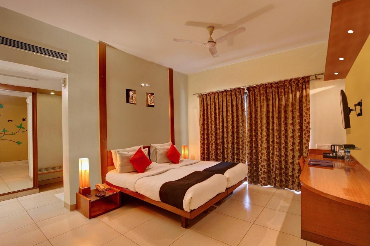 Capital O 16165 Cartier Hotel Bangalore
