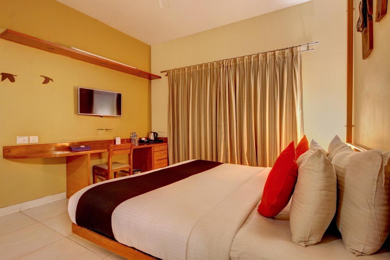 Capital O 16165 Cartier Hotel Bangalore