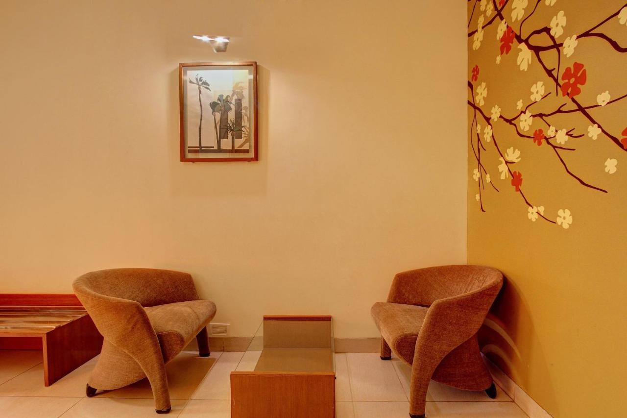 Capital O 16165 Cartier Hotel Bangalore
