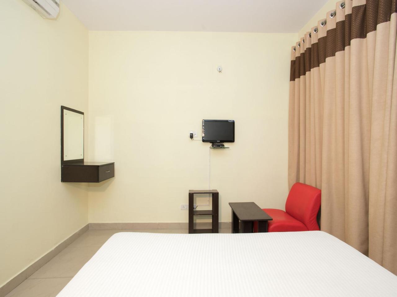 Oyo 10378 Hibiscus Mayflower Hotel Bangalore