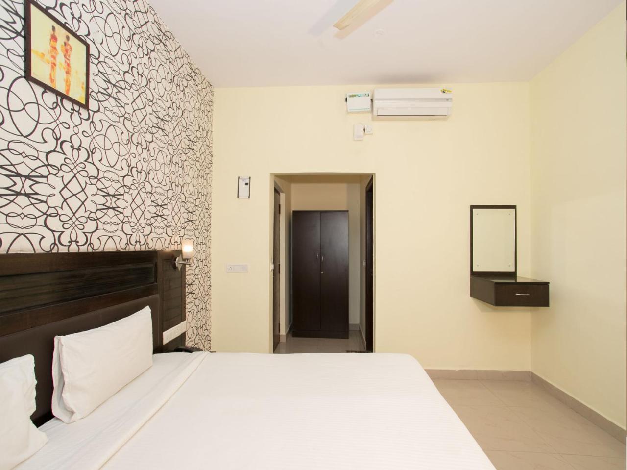 Oyo 10378 Hibiscus Mayflower Hotel Bangalore