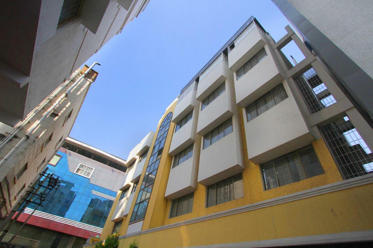 Oyo 27005 The Woodbridge Hotel Bangalore