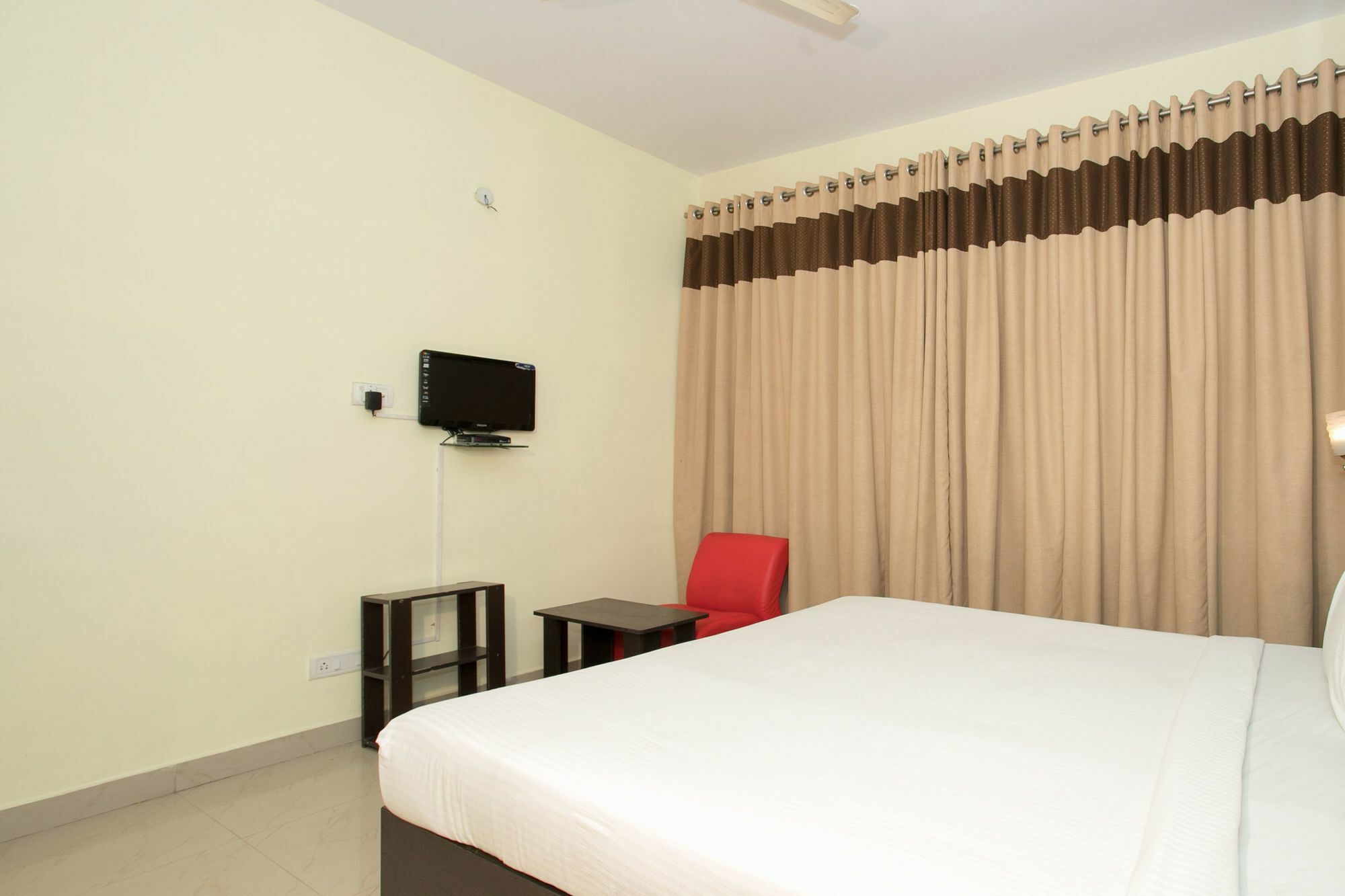 Oyo 10378 Hibiscus Mayflower Hotel Bangalore